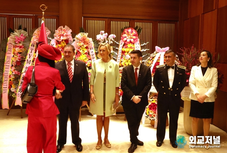 Ambassador H.E. Murat Tamer of Turkiye (far left), Mrs. Tamer and other senior diplomats of the Turkish Embassy in Seoul greet a guest at the Turkish national day reception held at Shilla Hotel in Seoul on Oct. 30, 2023.